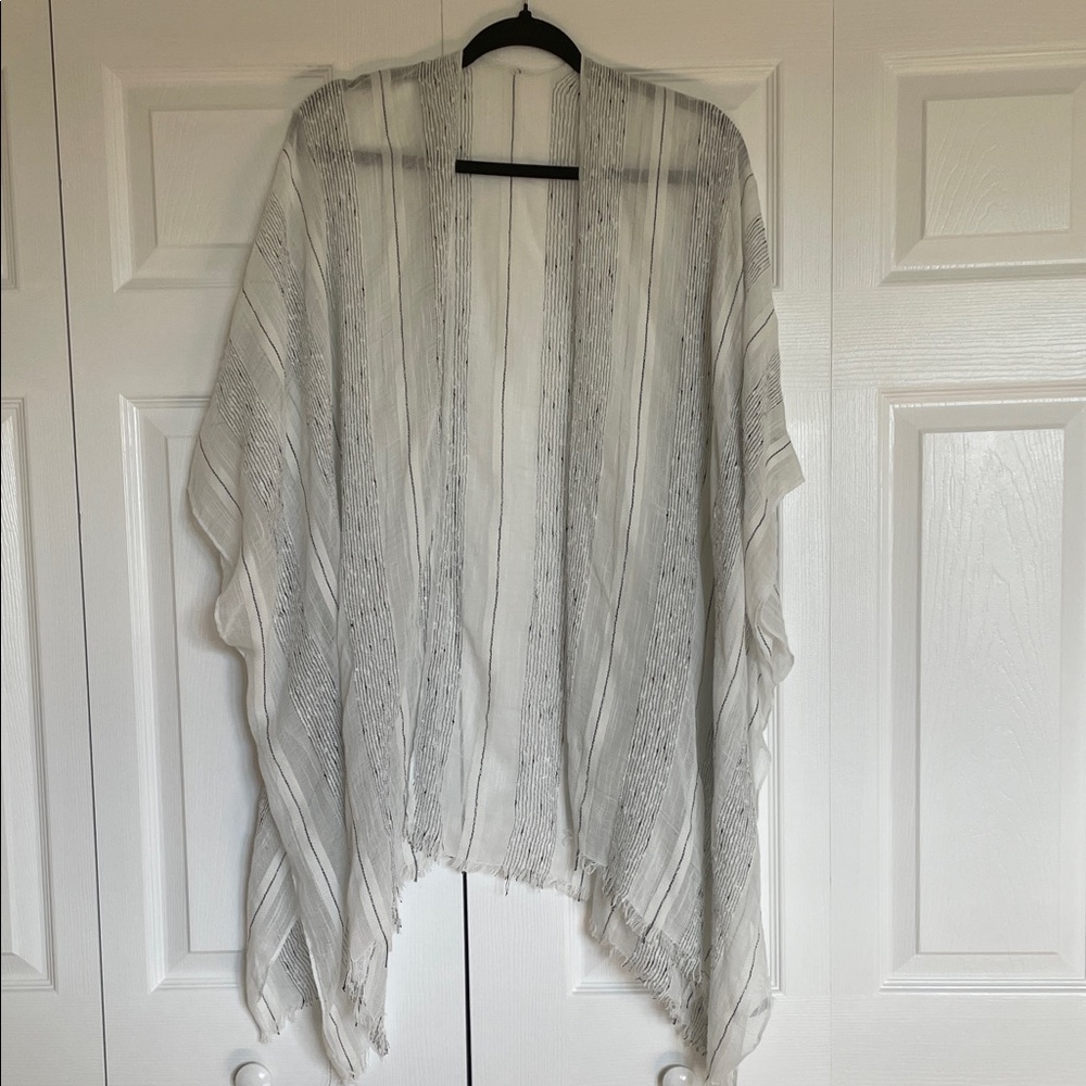 Sheer white/off white poncho with black and silver threads